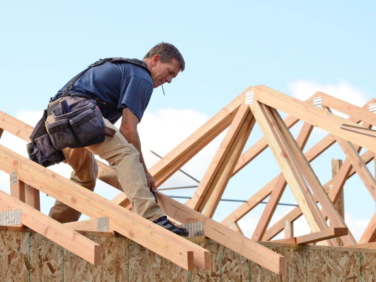Home builder working on a roof for a new home build in Lehigh Valley, PA